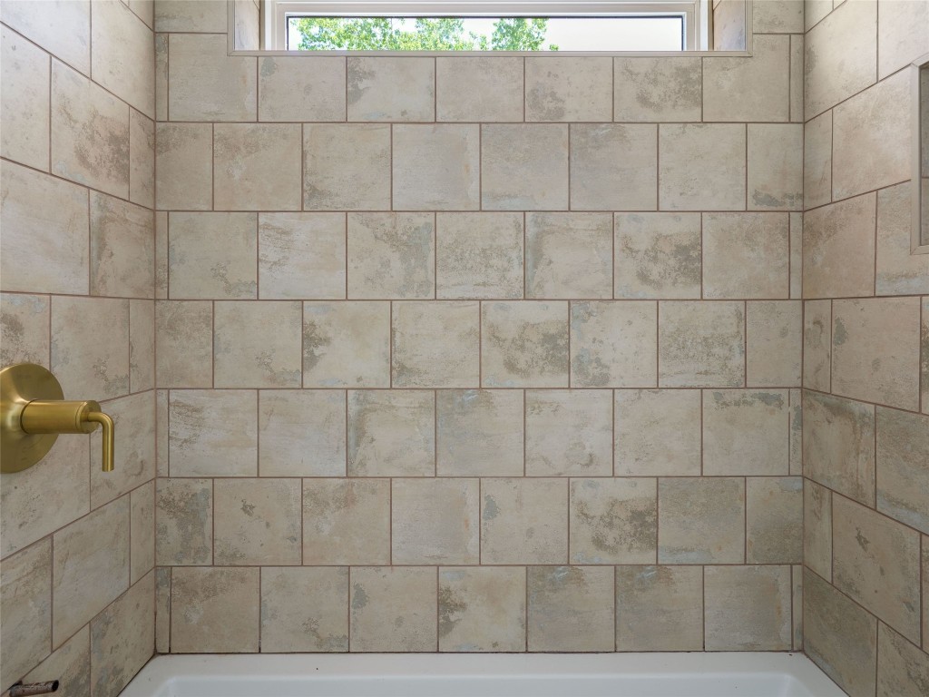 2609 Davis Lane, Unit 2 Austin, TX 78748 - Photo 22 of 26 a bathroom with a shower