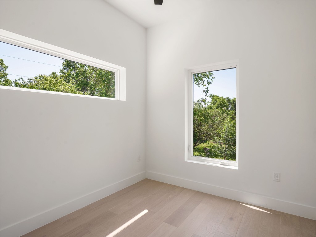 2609 Davis Lane, Unit 2 Austin, TX 78748 - Photo 24 of 26 an empty room with a window