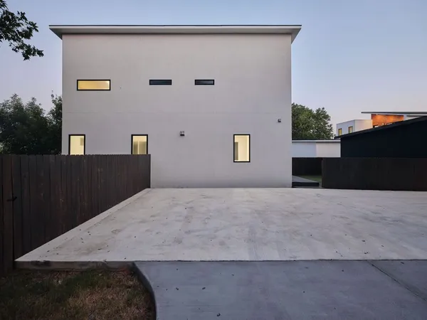 a view of outdoor space and front view of a house