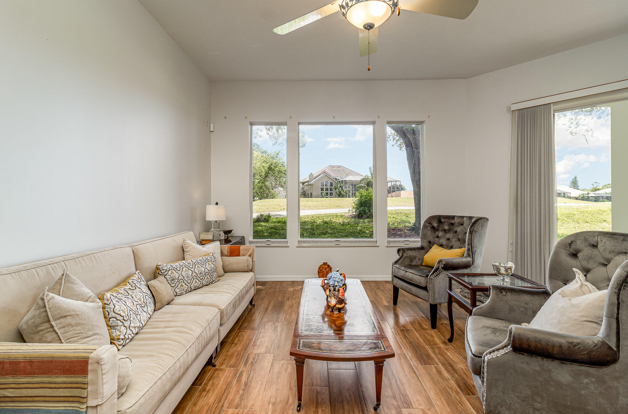 7951 Daventry Drive Melbourne, FL 32940 - Photo 12 of 46 a living room with furniture and a large window