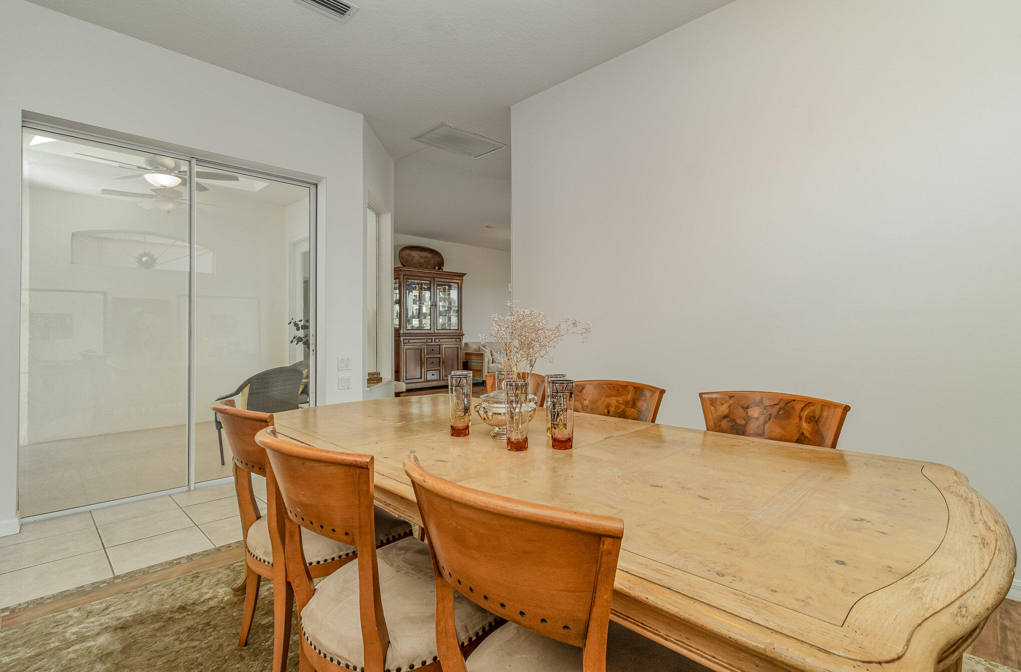 7951 Daventry Drive Melbourne, FL 32940 - Photo 17 of 46 a dining room with a table and chairs