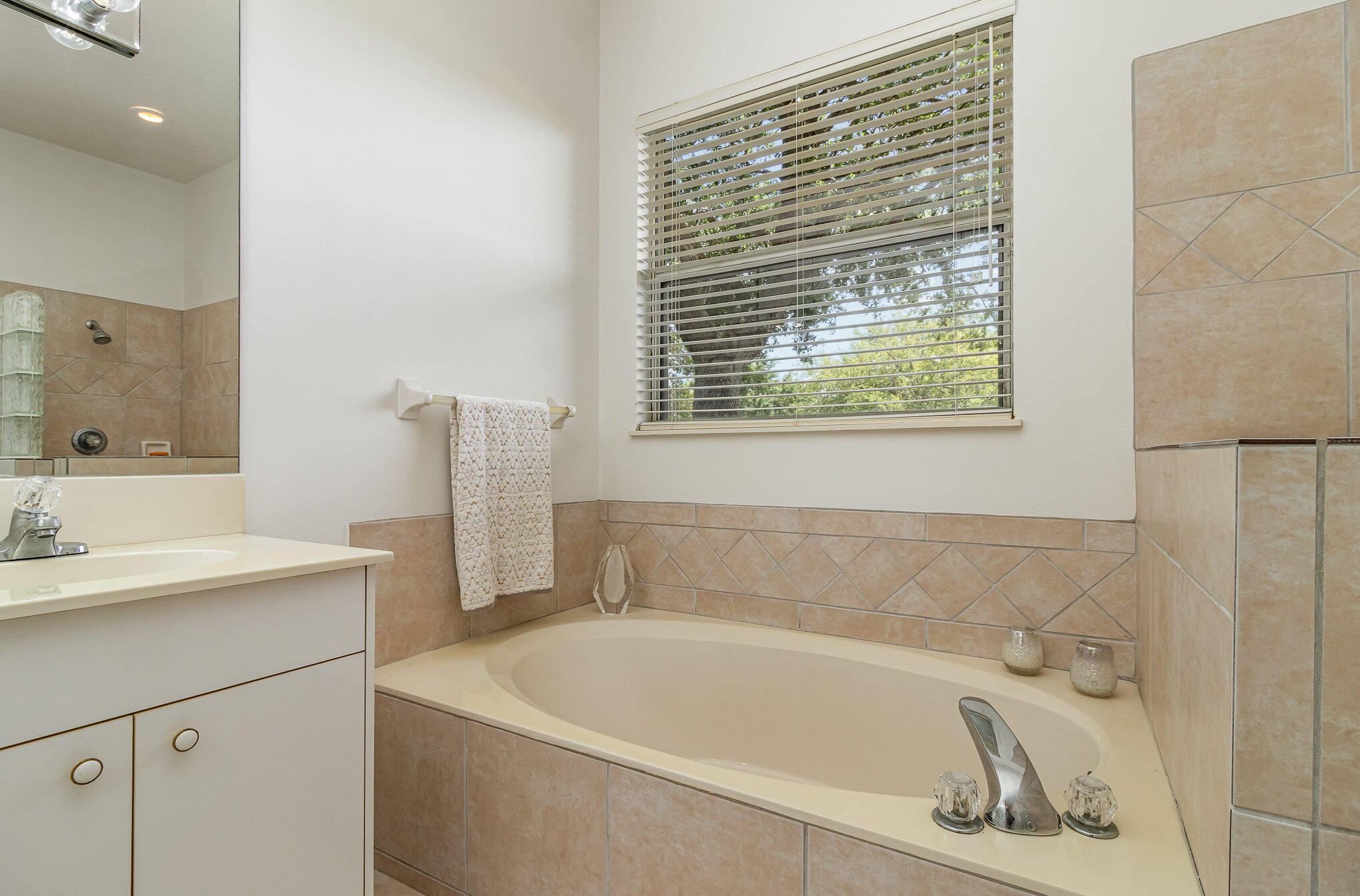 7951 Daventry Drive Melbourne, FL 32940 - Photo 23 of 46 a white bath tub sitting next to a white sink