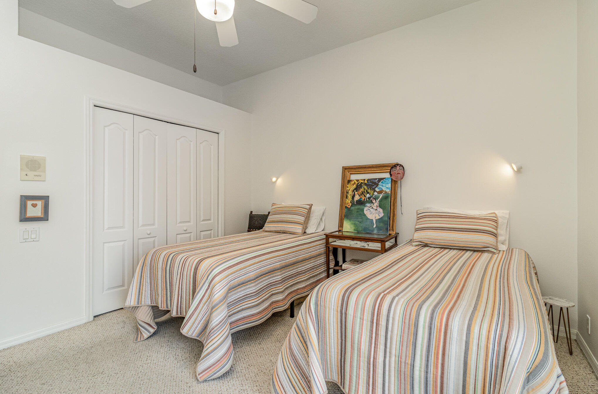 7951 Daventry Drive Melbourne, FL 32940 - Photo 25 of 46 a bedroom with two beds and a chandelier