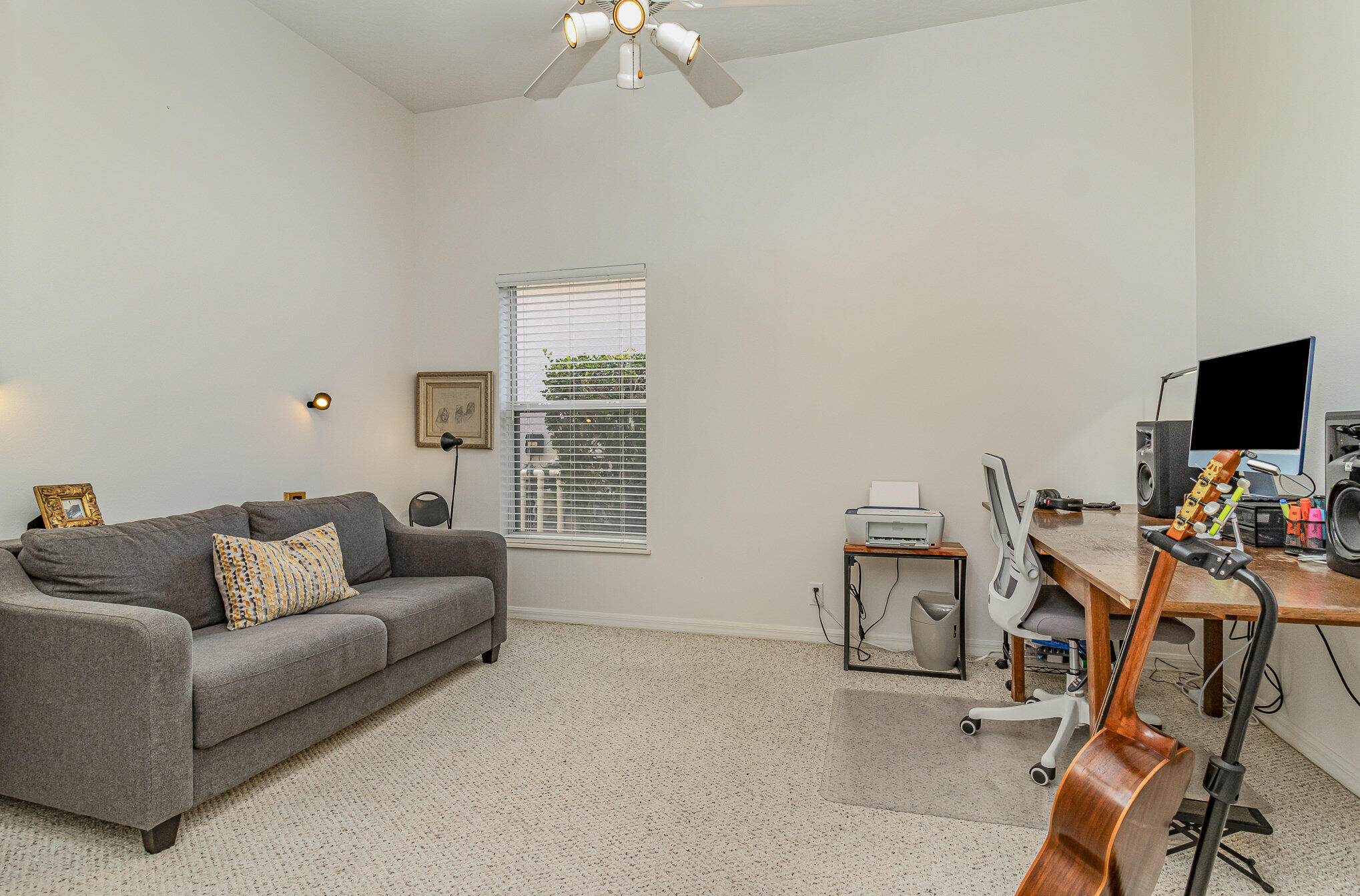 7951 Daventry Drive Melbourne, FL 32940 - Photo 28 of 46 a living room with furniture and a flat screen tv