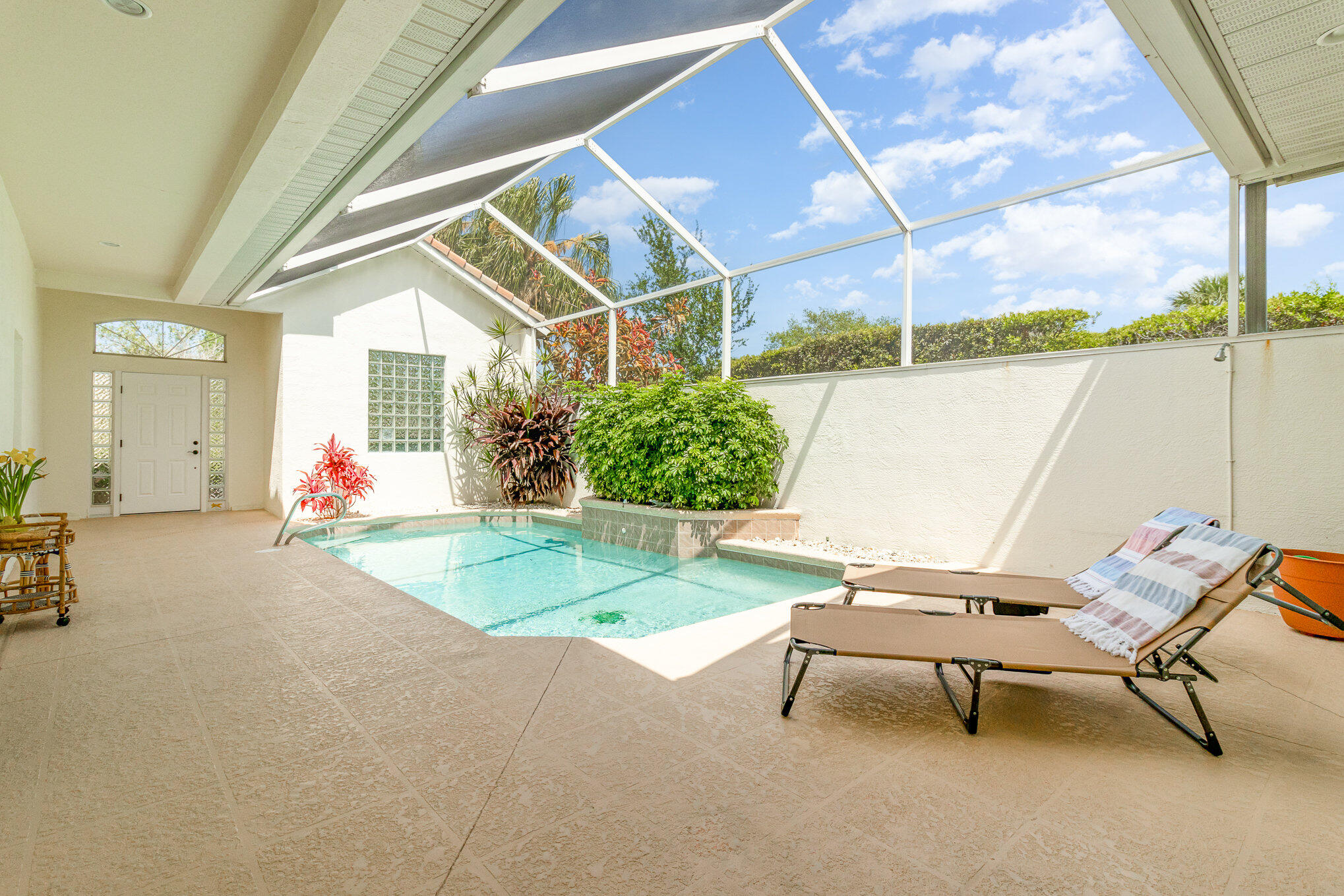 7951 Daventry Drive Melbourne, FL 32940 - Photo 31 of 46 a backyard of a house with table and chairs