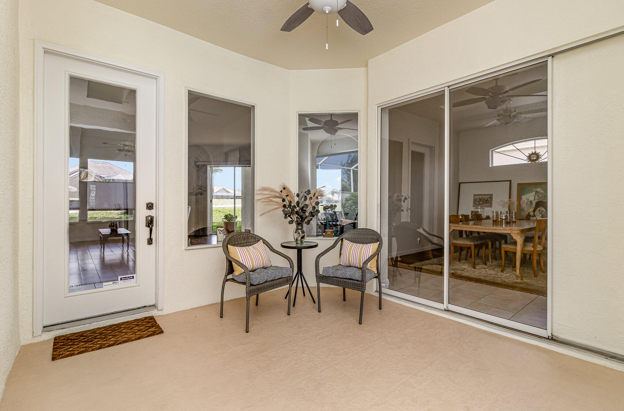 7951 Daventry Drive Melbourne, FL 32940 - Photo 32 of 46 a dining room with furniture and a window