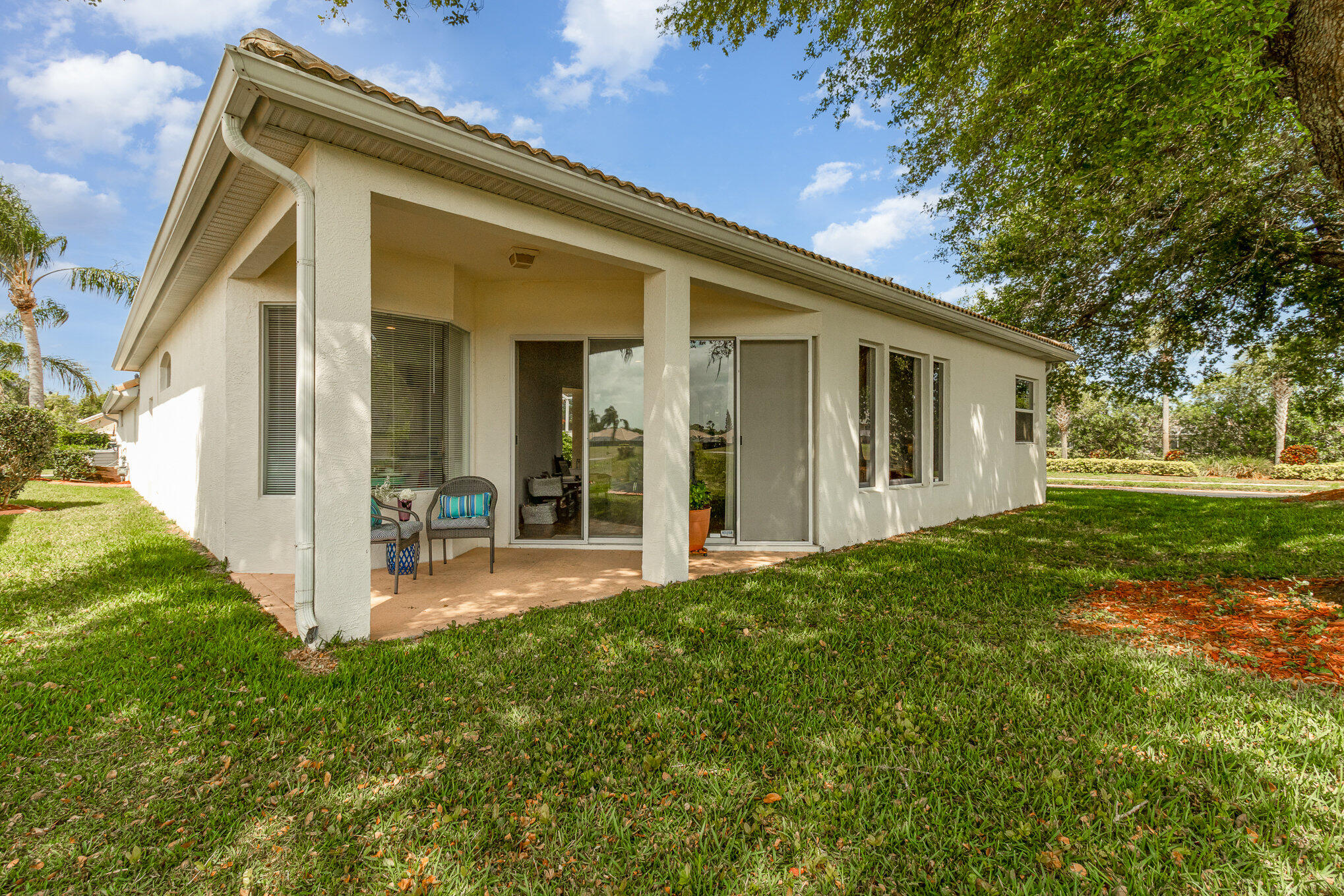 7951 Daventry Drive Melbourne, FL 32940 - Photo 34 of 46 a view of a house with backyard and porch