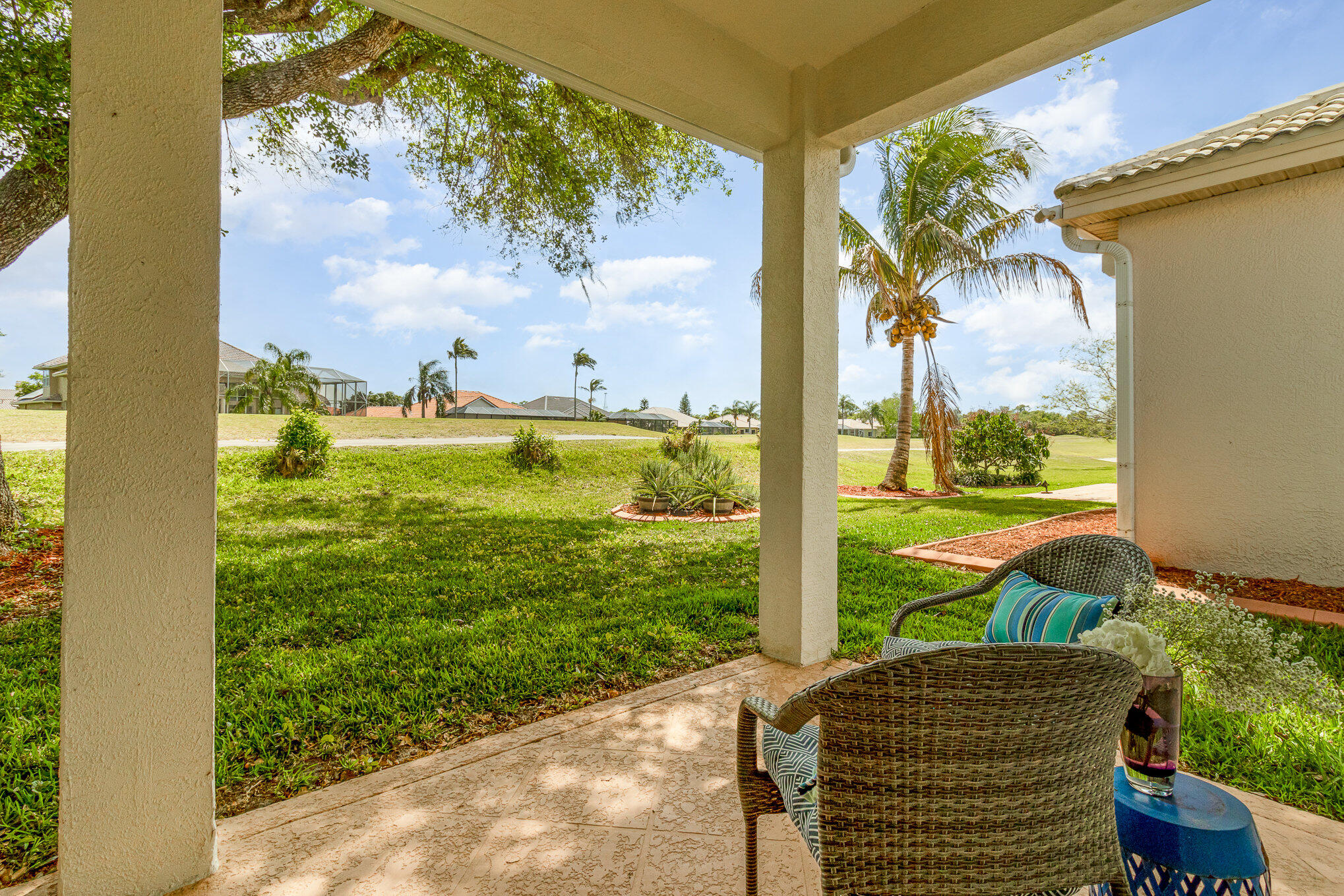 7951 Daventry Drive Melbourne, FL 32940 - Photo 36 of 46 a view of a garden from a patio