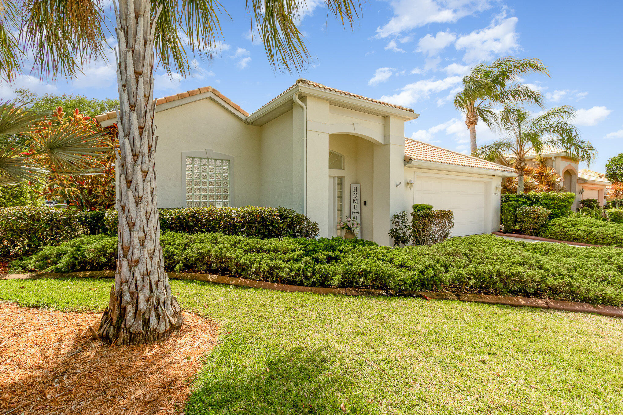 7951 Daventry Drive Melbourne, FL 32940 - Photo 38 of 46 a front view of a house with a yard