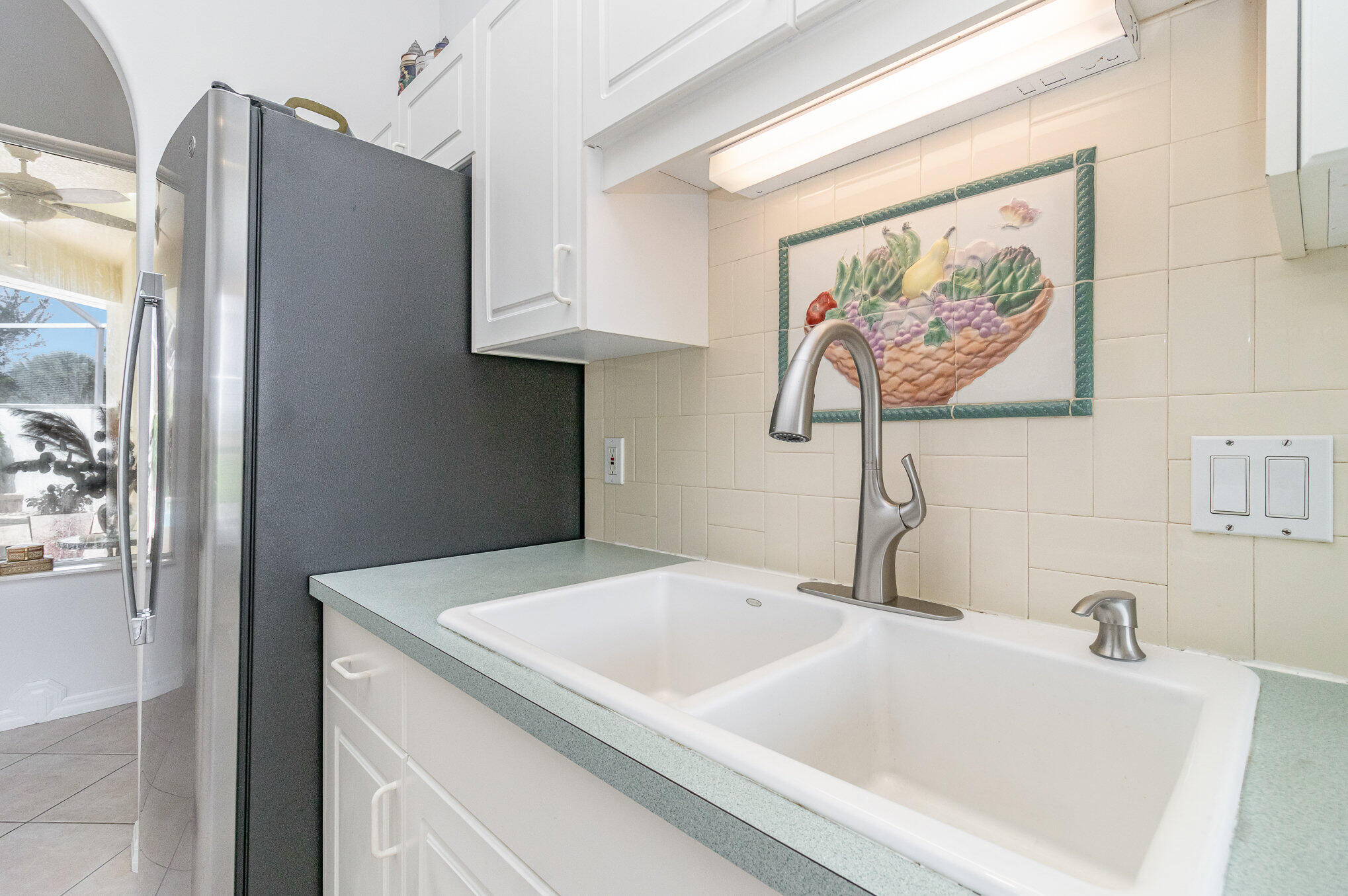7951 Daventry Drive Melbourne, FL 32940 - Photo 8 of 46 a bathroom with a sink and a mirror