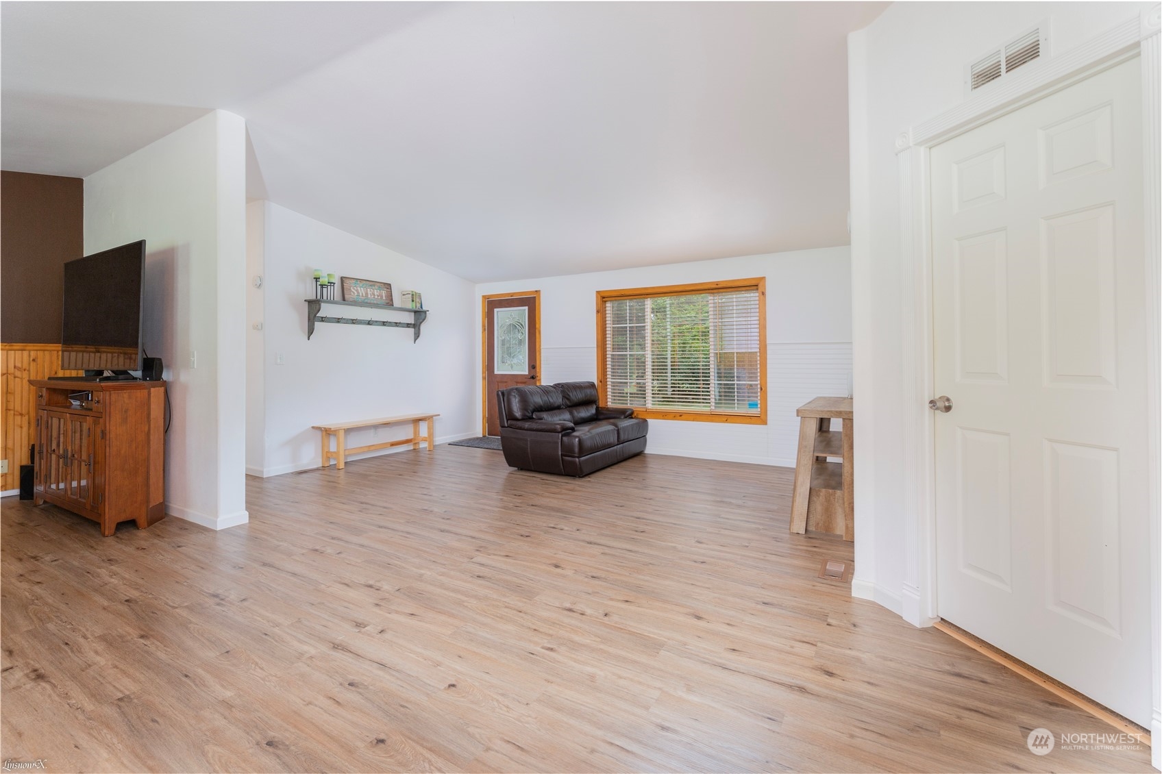 9138 176th Avenue Southwest Rochester, WA 98579 - Photo 14 of 25 a living room with furniture and a flat screen tv