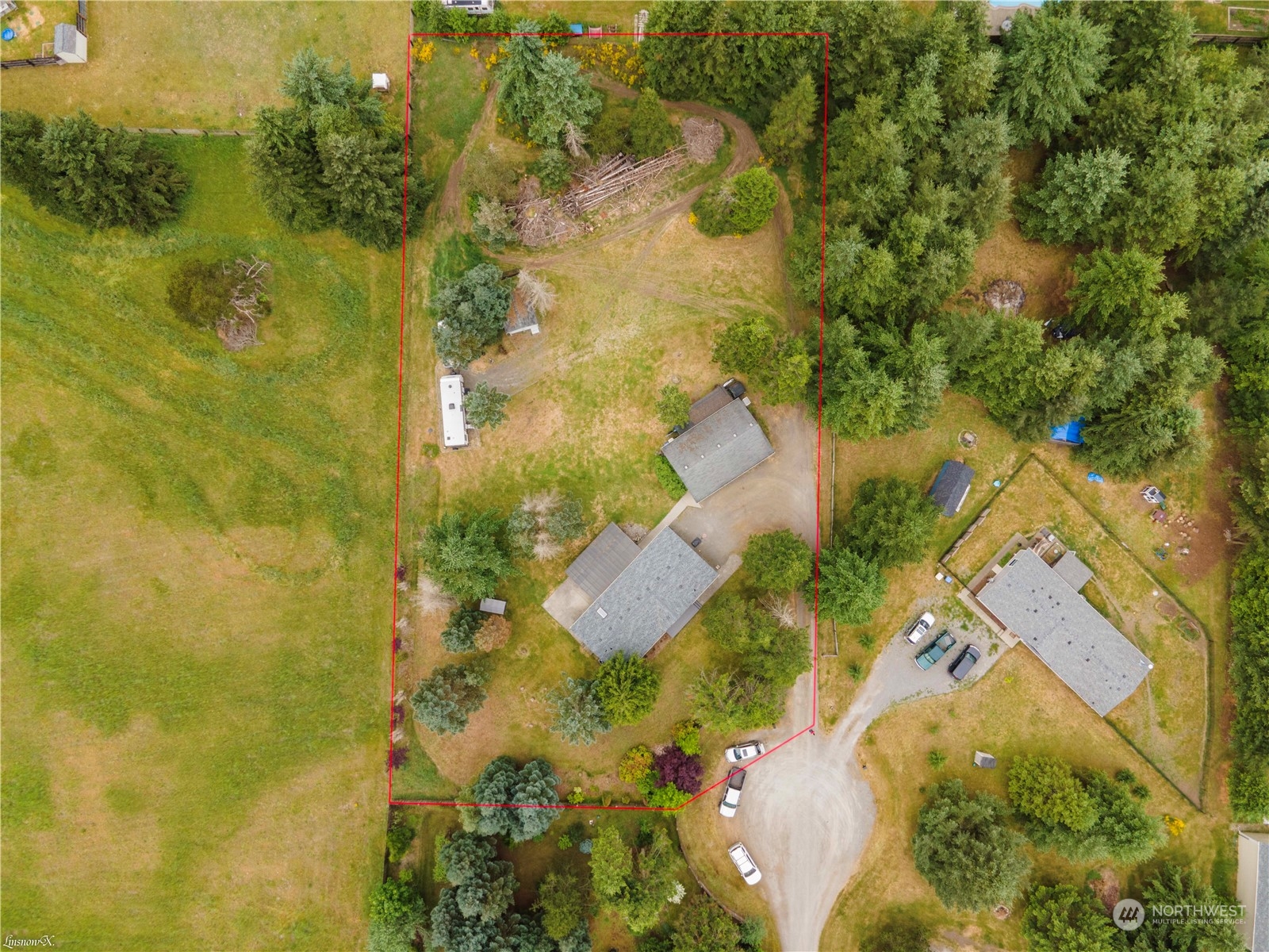 9138 176th Avenue Southwest Rochester, WA 98579 - Photo 25 of 25 an aerial view of residential house with swimming pool and green space