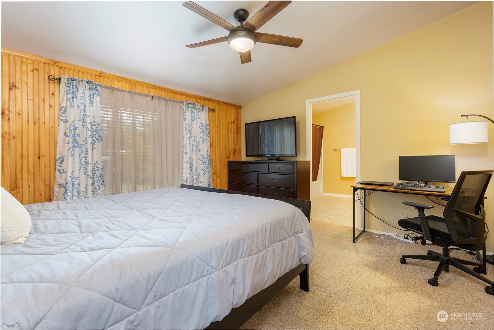 9138 176th Avenue Southwest Rochester, WA 98579 - Photo 6 of 25 a bedroom with a bed and a desk