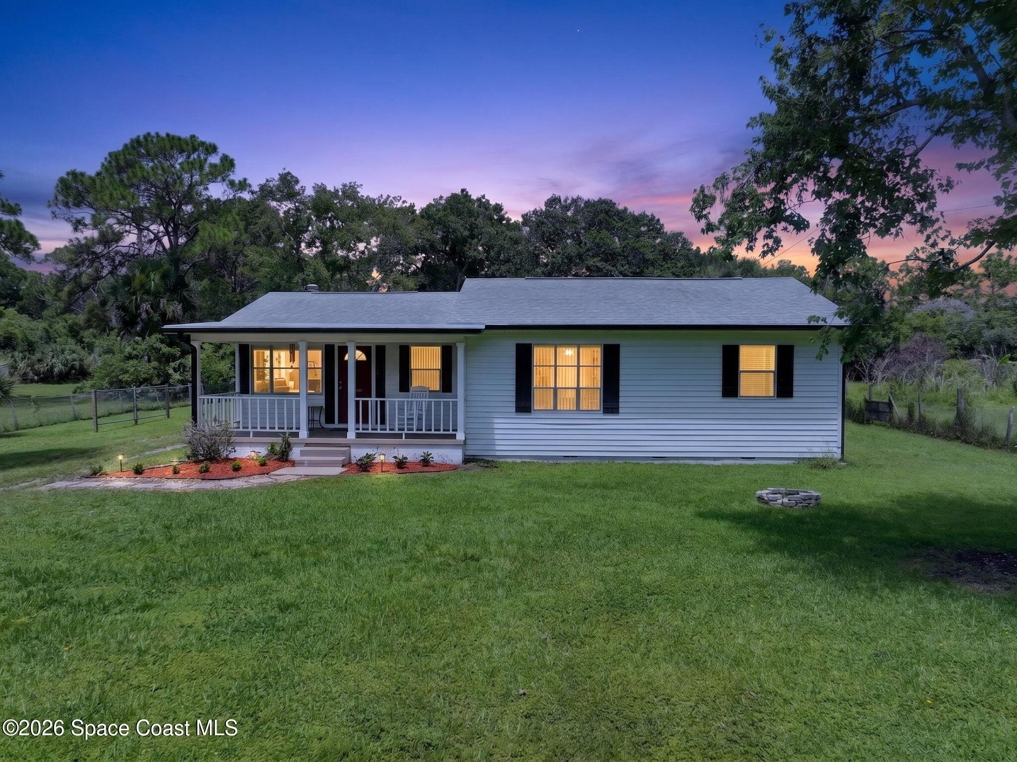 1944 Harlock Road Melbourne, FL 32934 - Photo 48 of 52 Front of Home Evening View