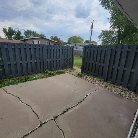 a view of a backyard with a trees