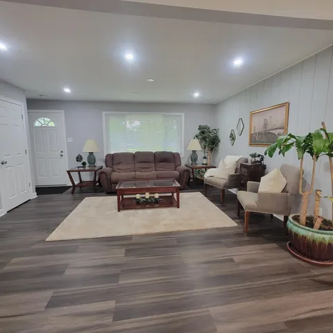 a living room with furniture and a couch