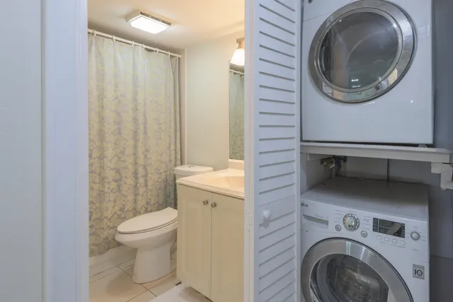a view of swimming pool with a table and chairs