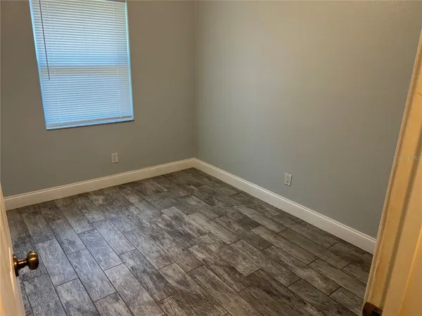 an empty room with a window