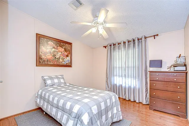 a view of a golf course with a lake