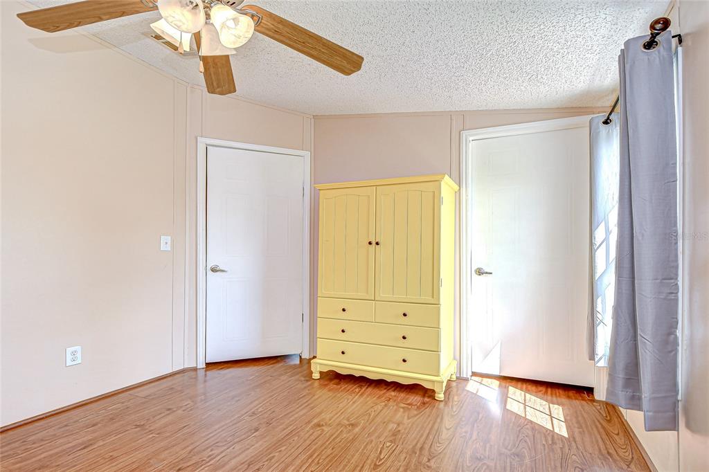 43650 County Road 54 East Kathleen, FL 33849 - Photo 31 of 72 wooden floor in an empty room with a window