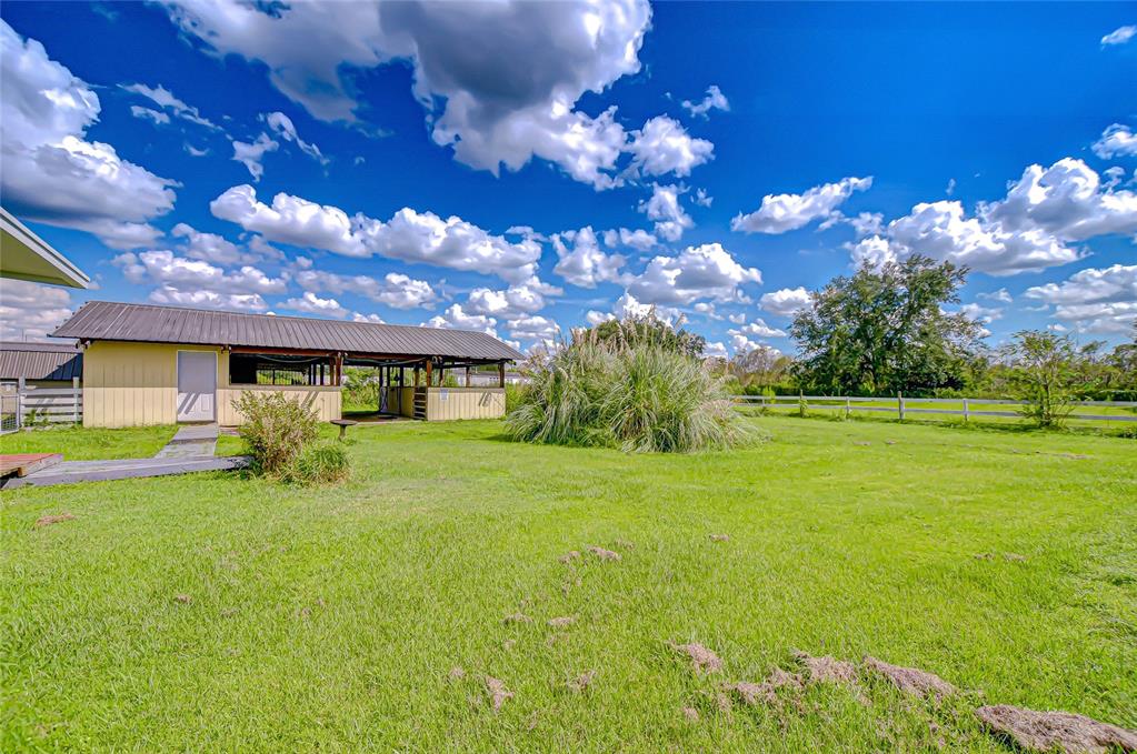 43650 County Road 54 East Kathleen, FL 33849 - Photo 52 of 72 a view of a house with a big yard