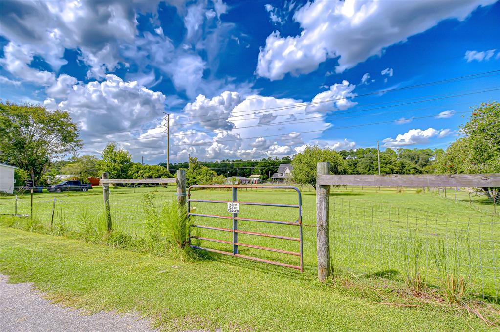 43650 County Road 54 East Kathleen, FL 33849 - Photo 55 of 72 a view of a lake with a big yard