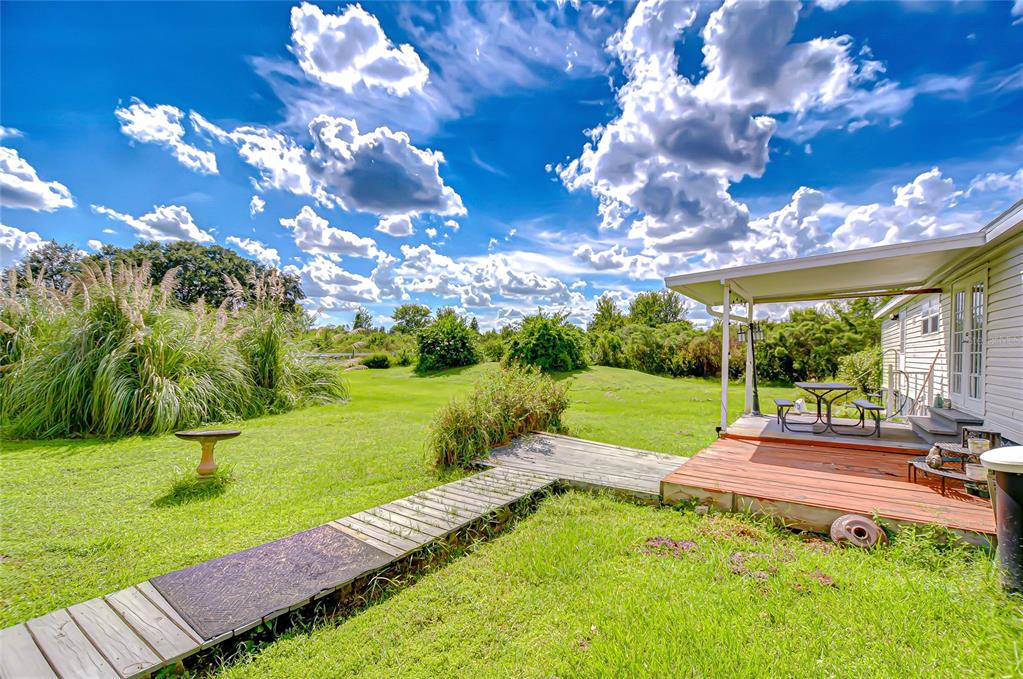 43650 County Road 54 East Kathleen, FL 33849 - Photo 56 of 72 a view of yard with swimming pool and green space