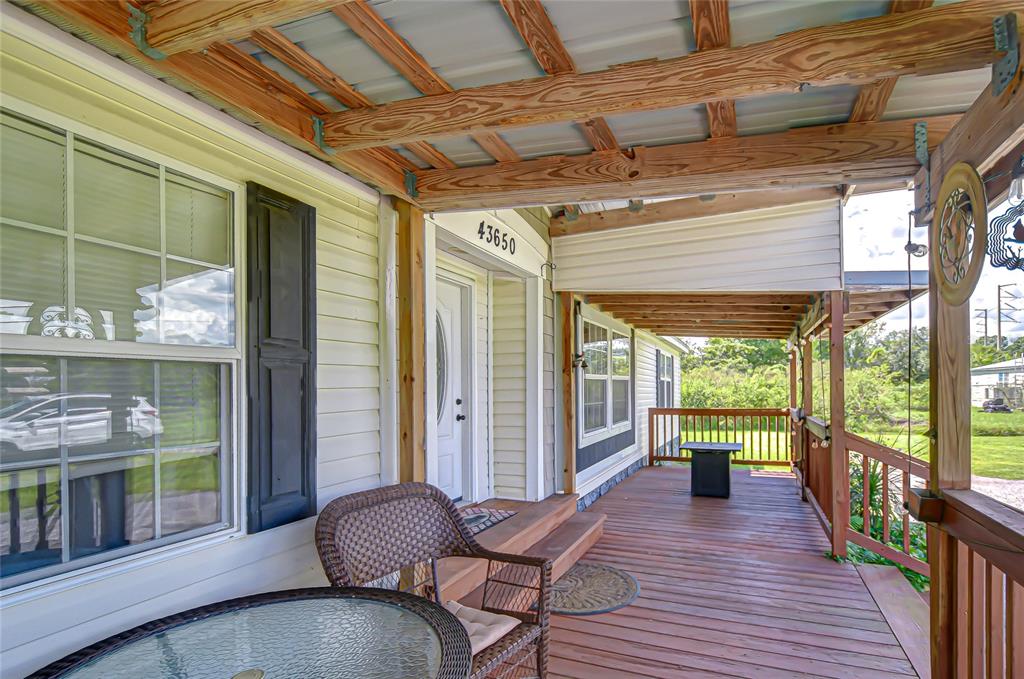 43650 County Road 54 East Kathleen, FL 33849 - Photo 64 of 72 a living room with furniture and a large window