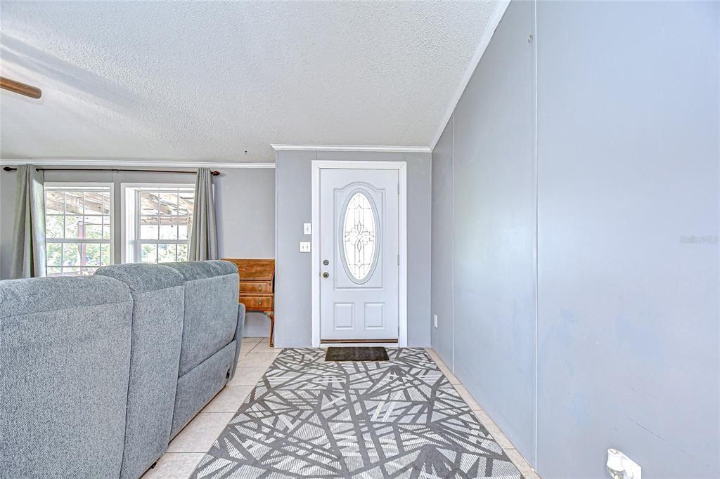 43650 County Road 54 East Kathleen, FL 33849 - Photo 7 of 72 a bedroom with furniture and a window