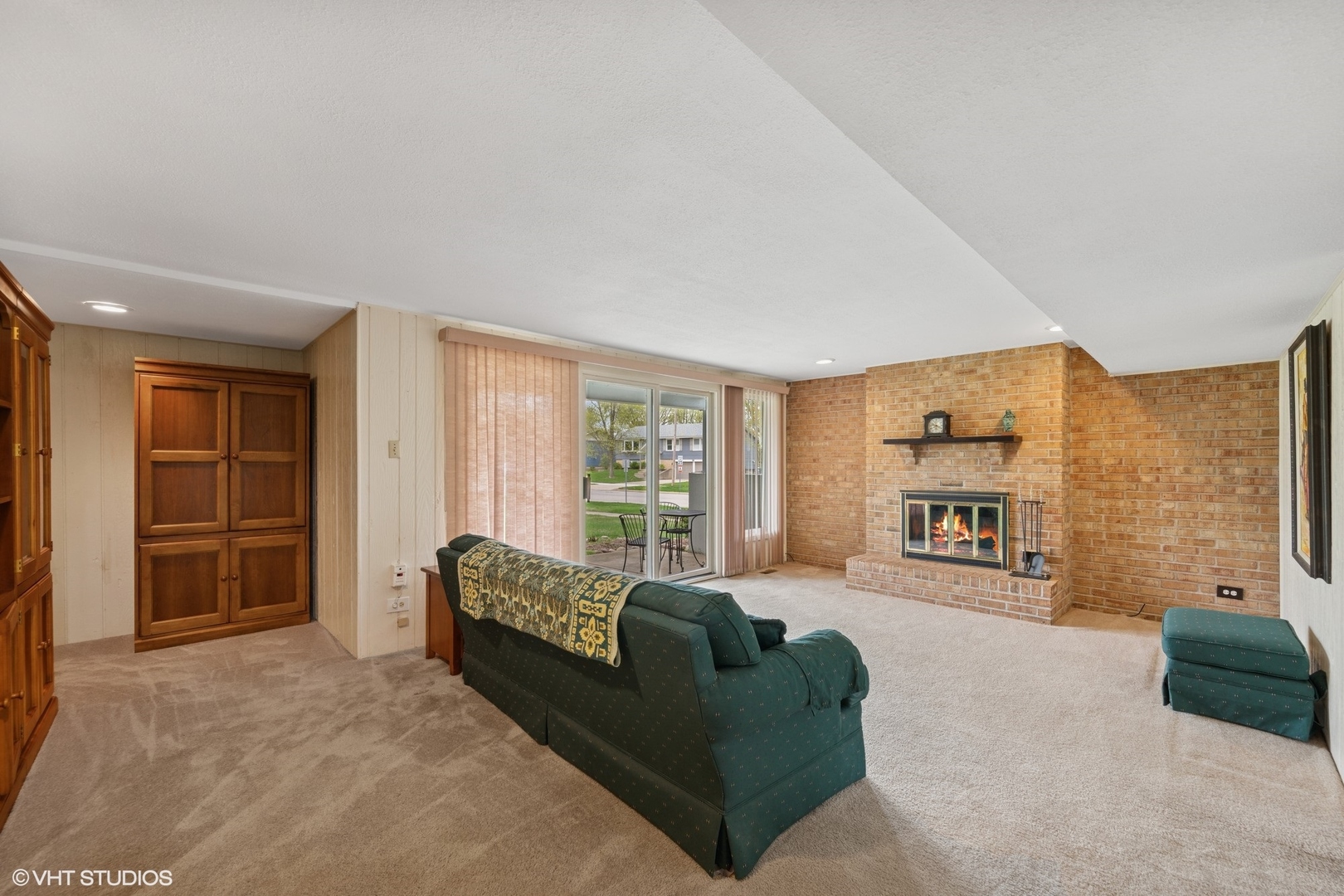 1750 Chippendale Road Hoffman Estates, IL 60169 - Photo 11 of 19 a living room with furniture and a flat screen tv