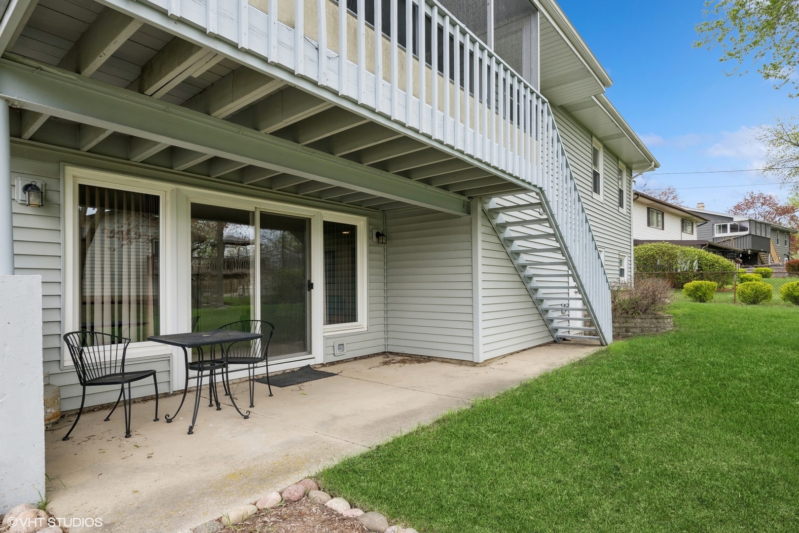 1750 Chippendale Road Hoffman Estates, IL 60169 - Photo 15 of 19 a view of a chair and table in the back yard of the house