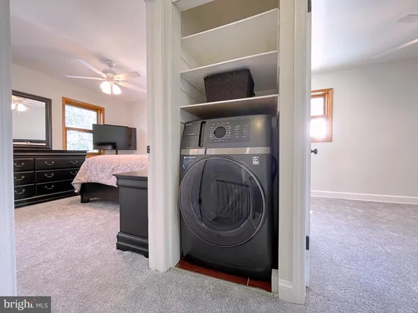 a view of living room washer and dryer