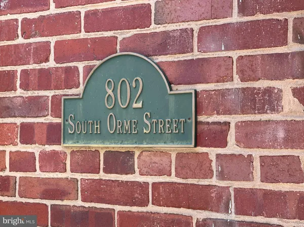 a sign that is on the wall of building
