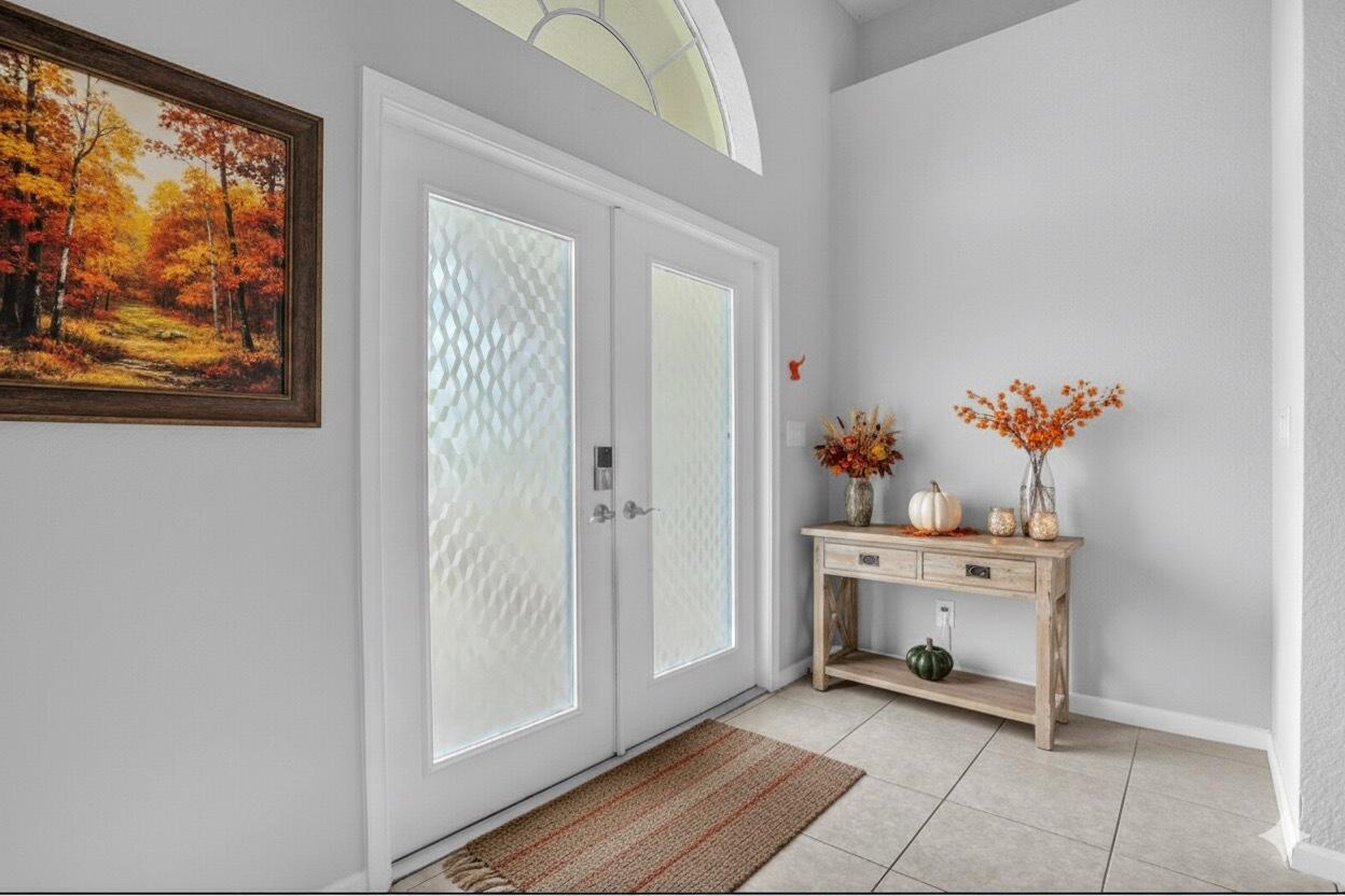 13218 86th Road North The Acreage, FL 33412 - Photo 4 of 69 a view of an entryway with wooden floor