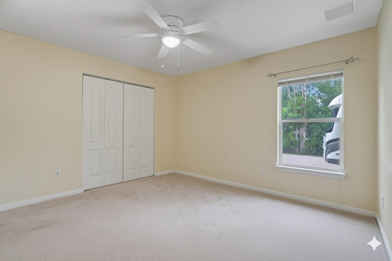 13218 86th Road North The Acreage, FL 33412 - Photo 44 of 69 an empty room with a window