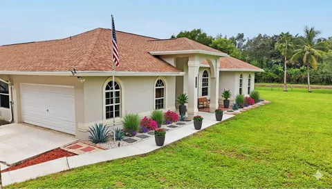 $699,000 | 13218 86th Road North, The Acreage, FL 33412