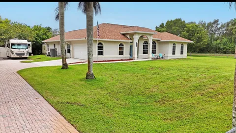 $699,000 | 13218 86th Road North, The Acreage, FL 33412