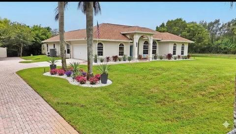 $699,000 | 13218 86th Road North, The Acreage, FL 33412