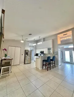 a bathroom with a double vanity sink and mirror