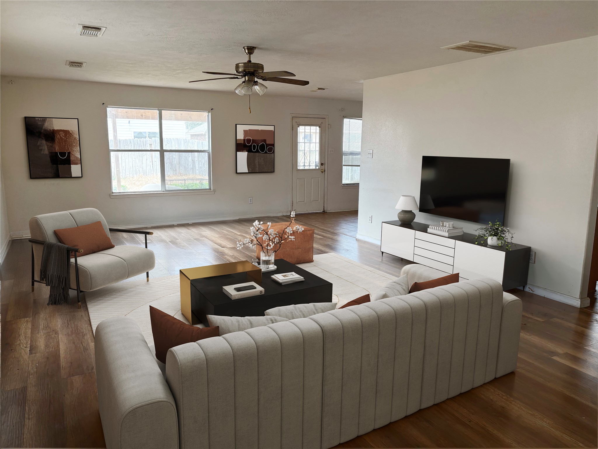 14411 Brunswick Point Lane Houston, TX 77047 - Photo 3 of 7 a living room with furniture and a flat screen tv