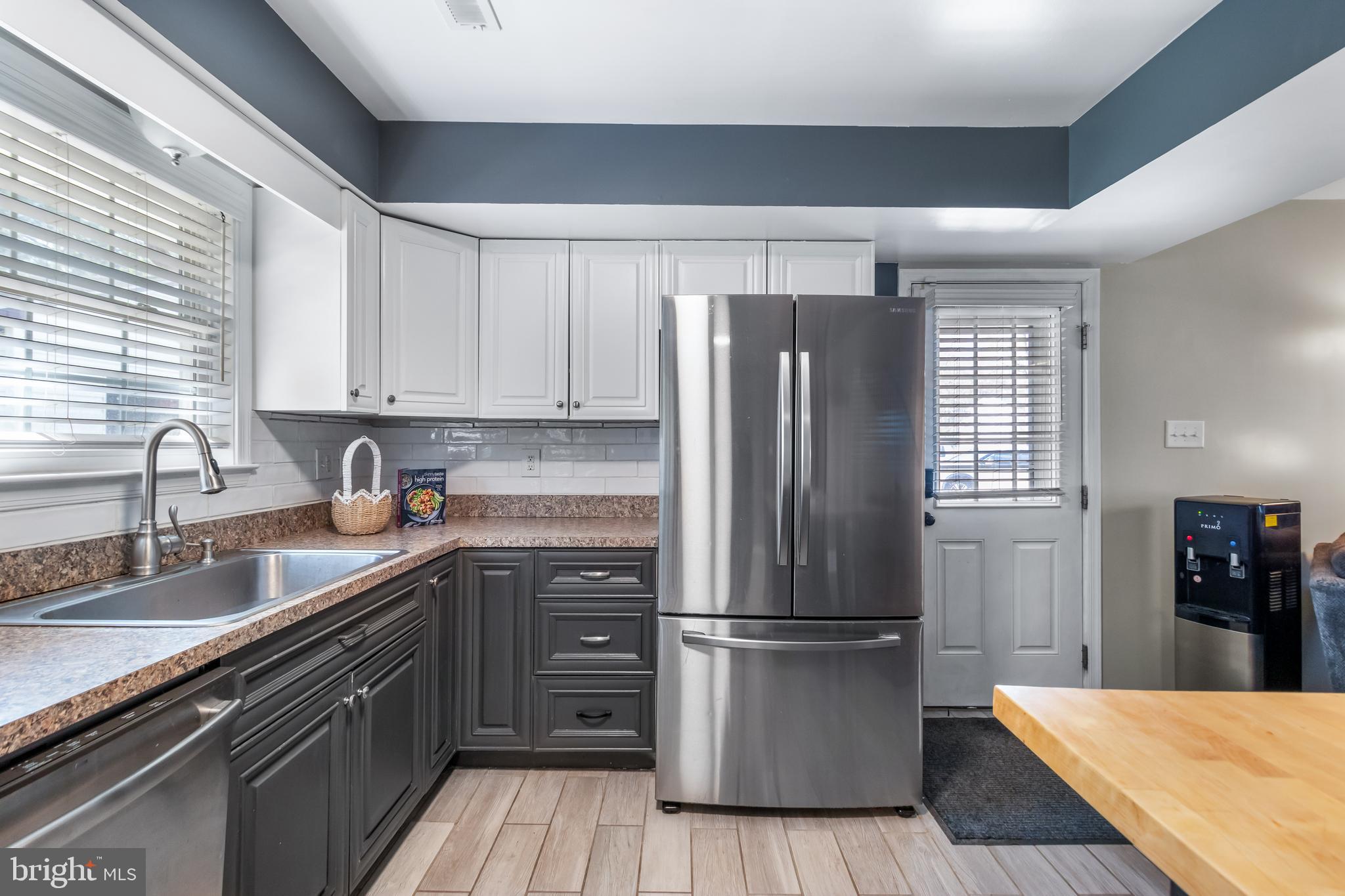 22 Marshall Road Waldorf, MD 20602 - Photo 14 of 41 a kitchen with stainless steel appliances granite countertop a refrigerator sink and cabinets