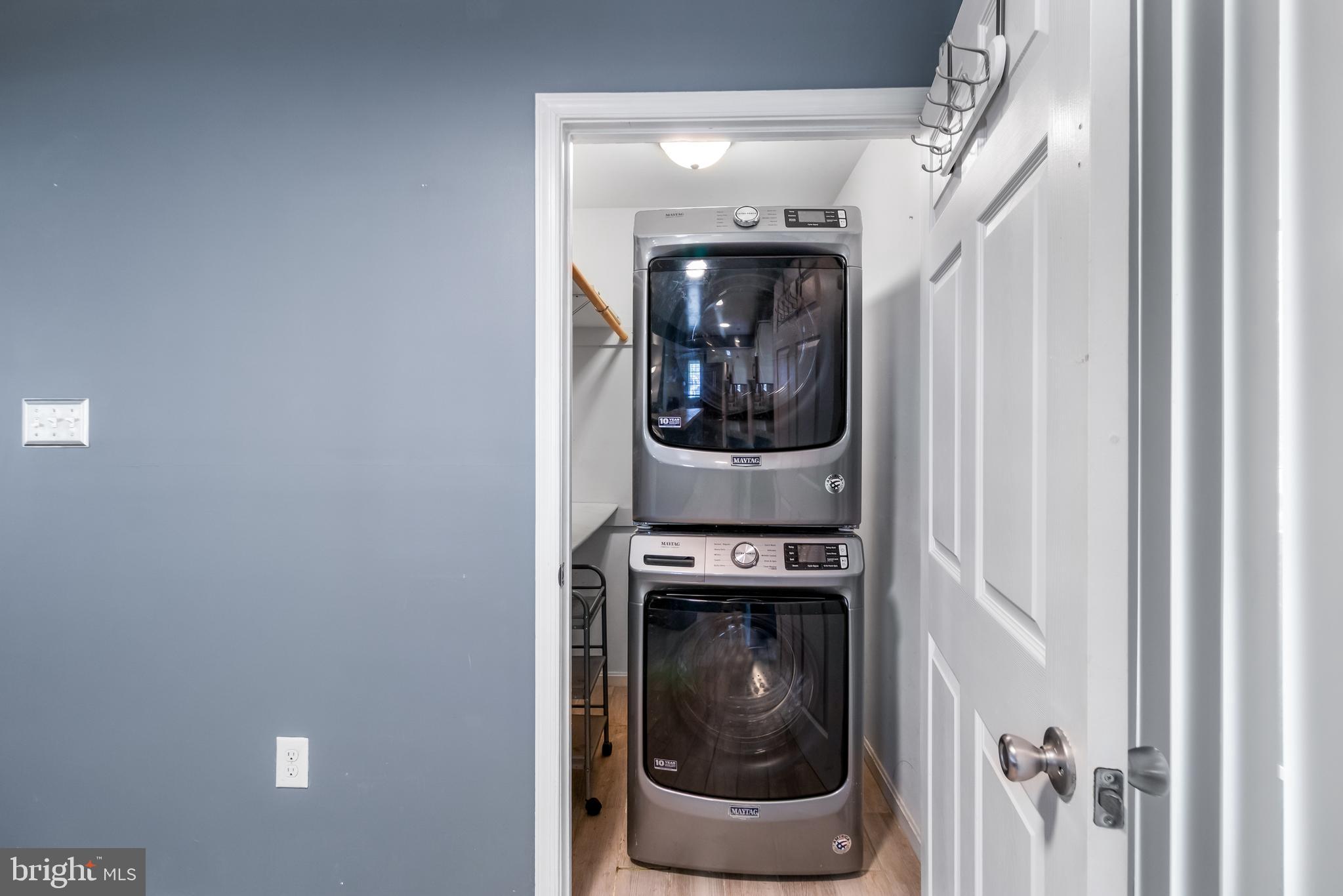 22 Marshall Road Waldorf, MD 20602 - Photo 16 of 41 a room with a stove and a washing machine
