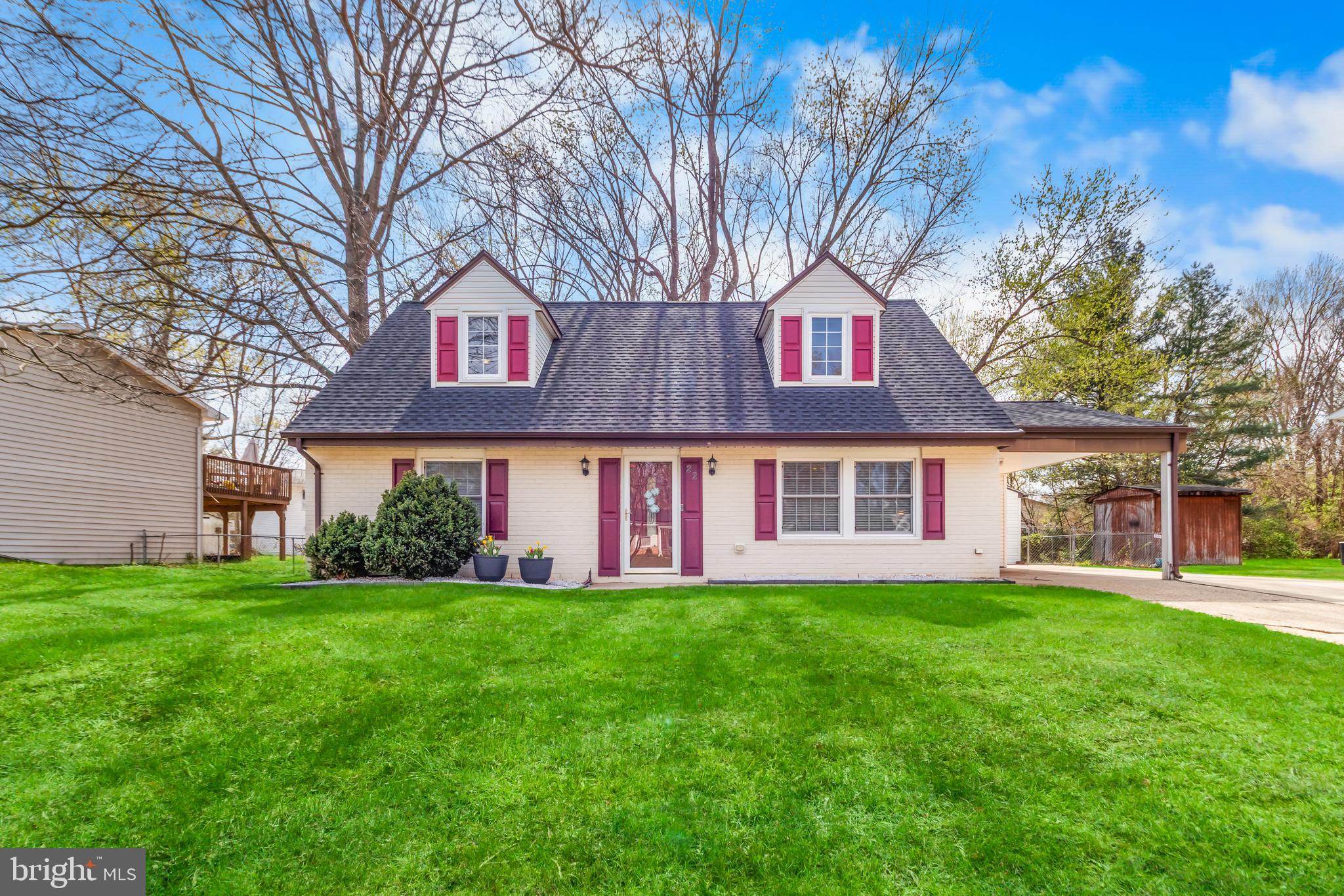 22 Marshall Road Waldorf, MD 20602 - Photo 2 of 41 a view of a brick house with a big yard and large trees