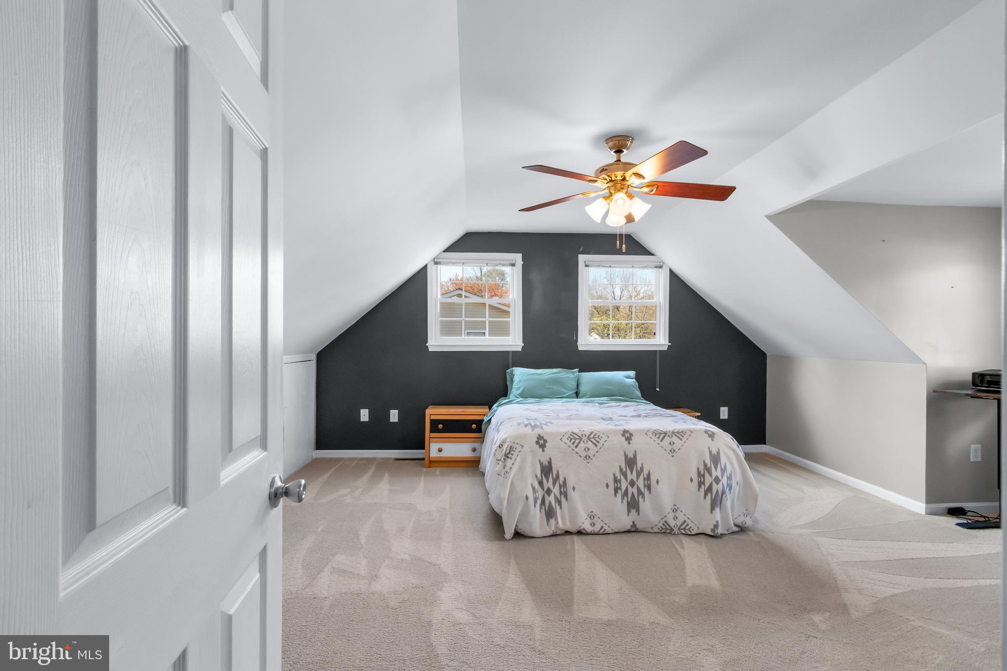 22 Marshall Road Waldorf, MD 20602 - Photo 24 of 41 a bedroom with a bed and a chandelier