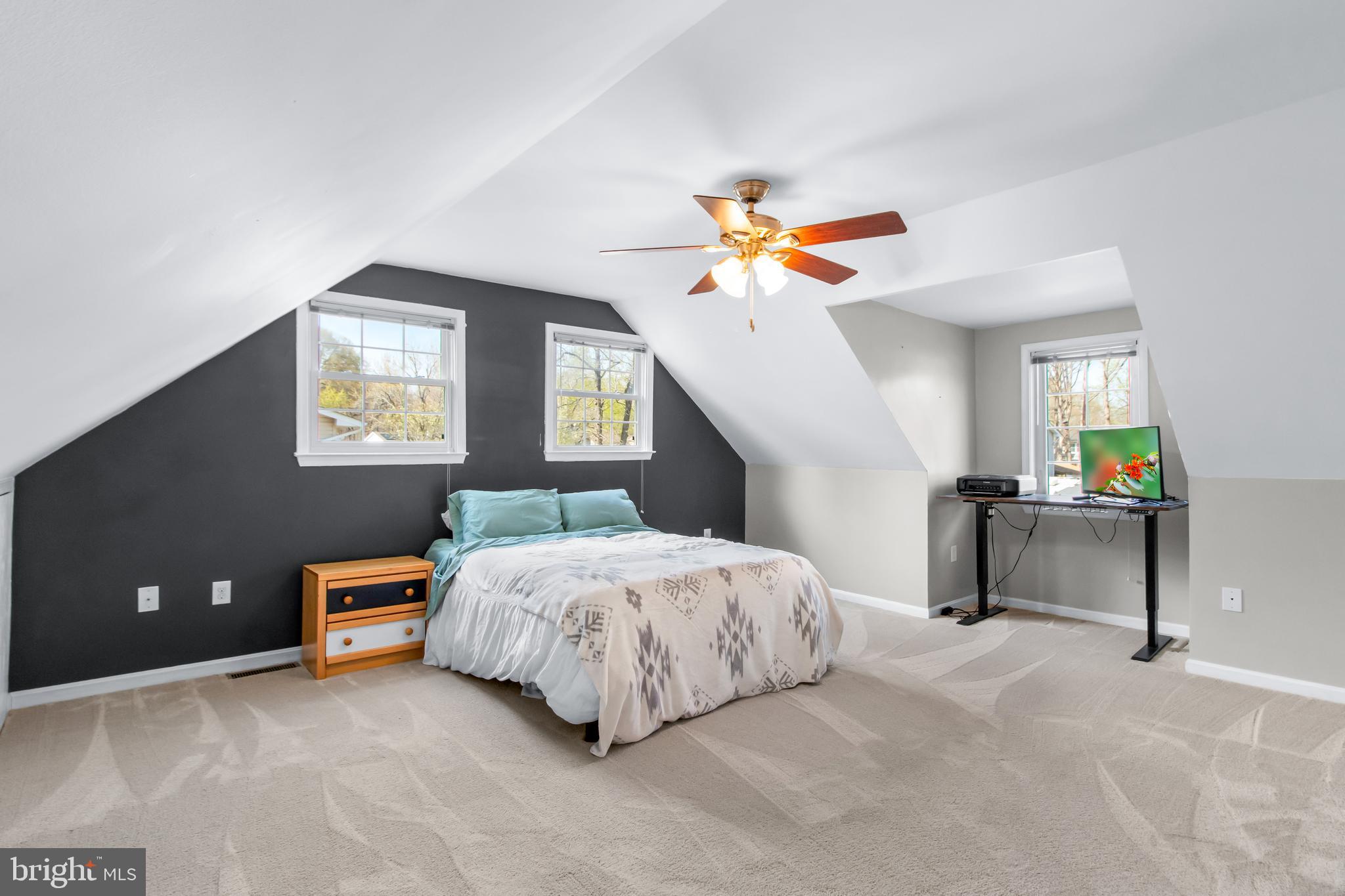 22 Marshall Road Waldorf, MD 20602 - Photo 25 of 41 a bedroom with a bed and a chandelier