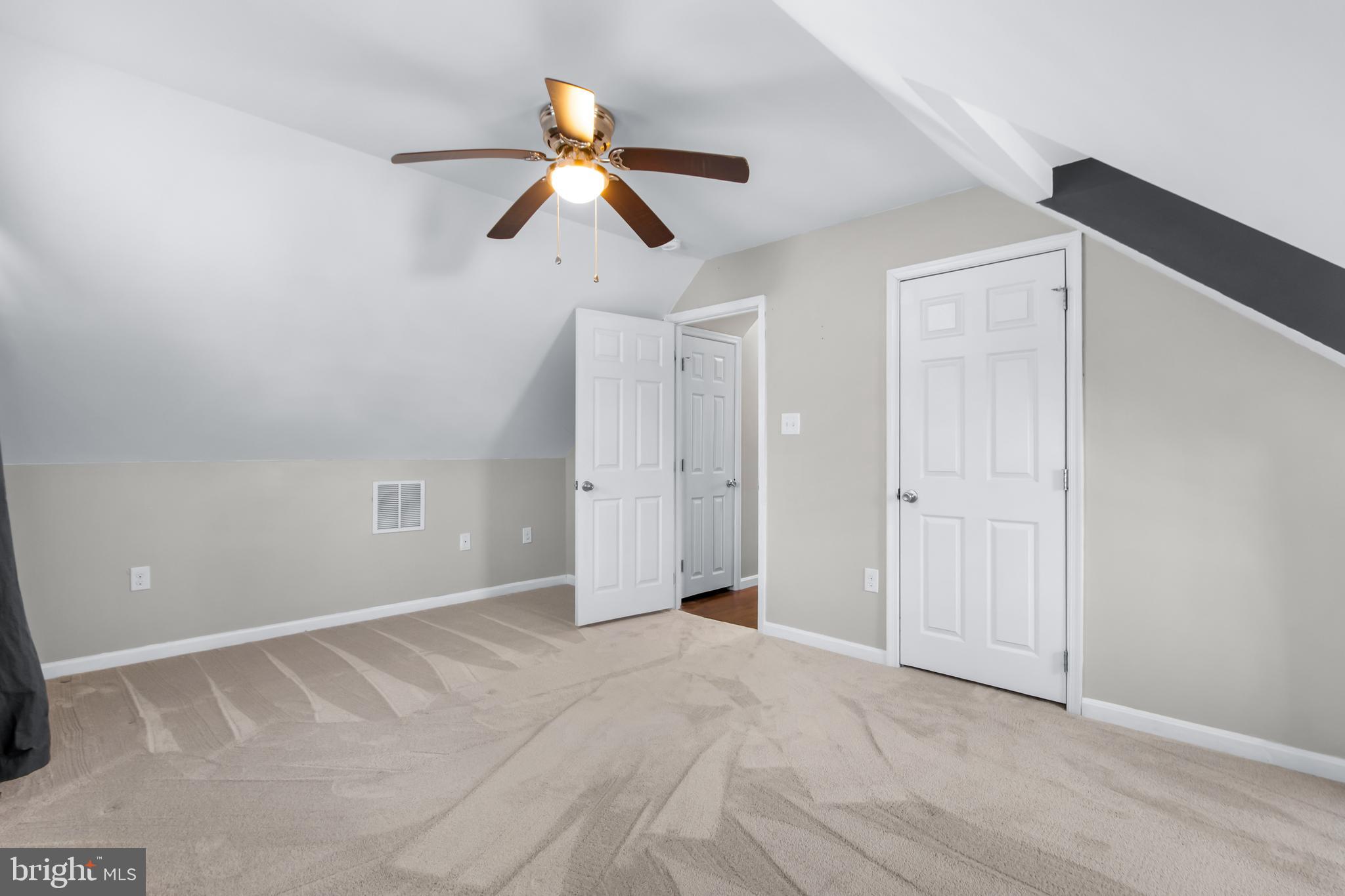 22 Marshall Road Waldorf, MD 20602 - Photo 26 of 41 a view of a room with a ceiling fan and window