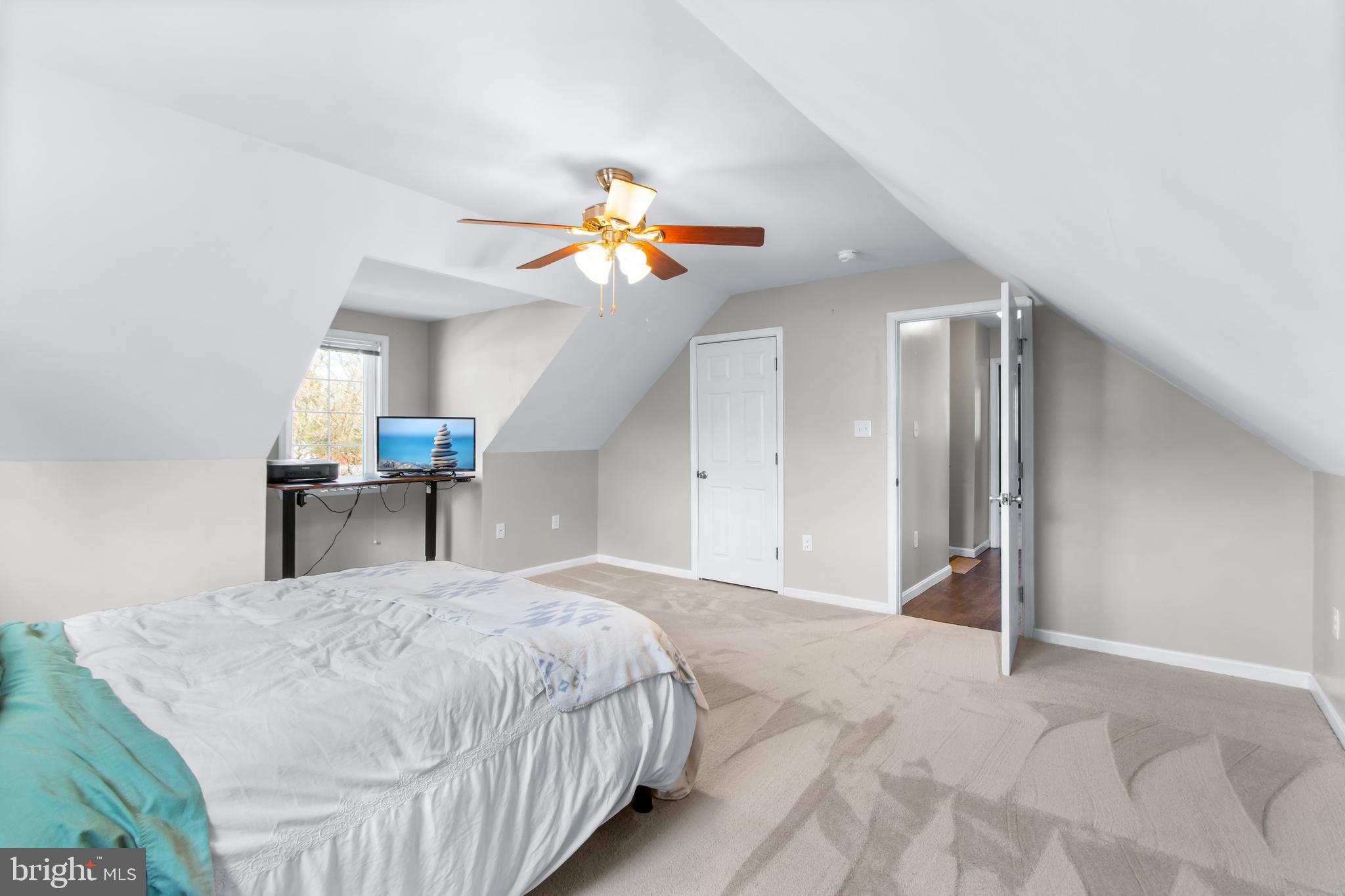 22 Marshall Road Waldorf, MD 20602 - Photo 28 of 41 a bedroom with a bed and a chandelier