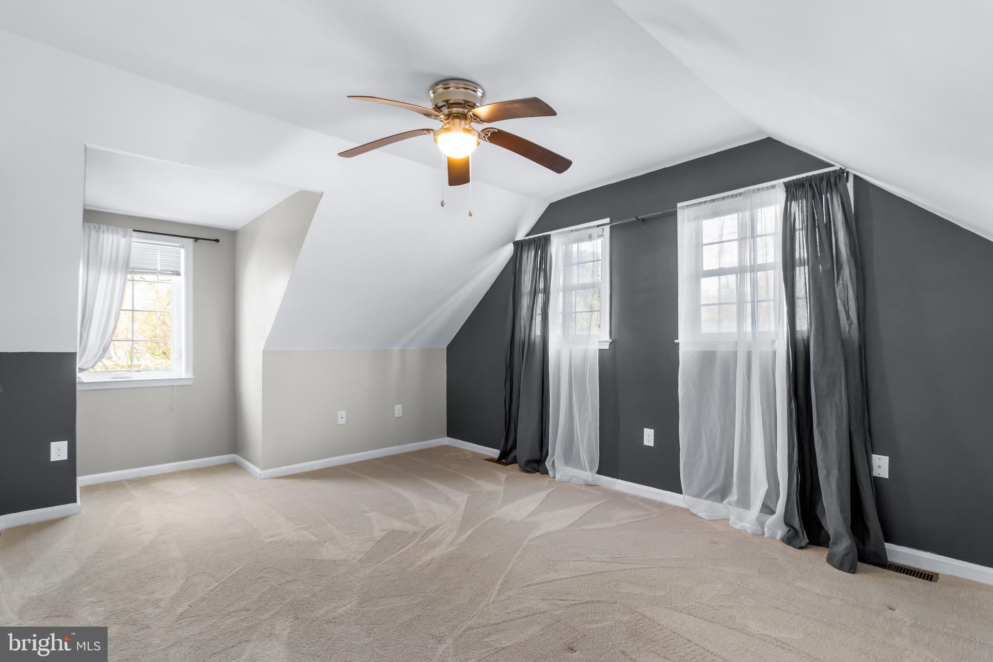 22 Marshall Road Waldorf, MD 20602 - Photo 30 of 41 a view of a big room with windows and chandelier fan