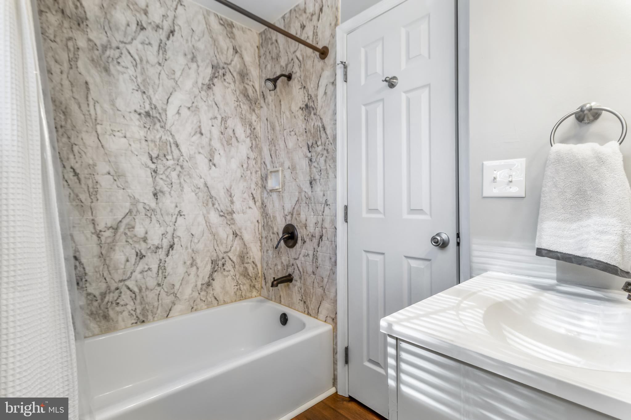 22 Marshall Road Waldorf, MD 20602 - Photo 32 of 41 a bathroom with a bathtub and shower