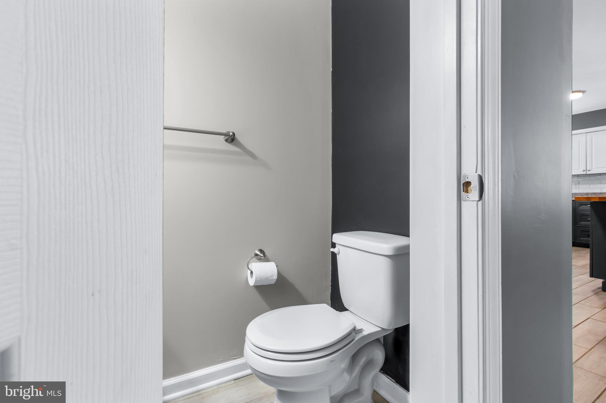 22 Marshall Road Waldorf, MD 20602 - Photo 33 of 41 a white toilet sitting next to a small bathroom